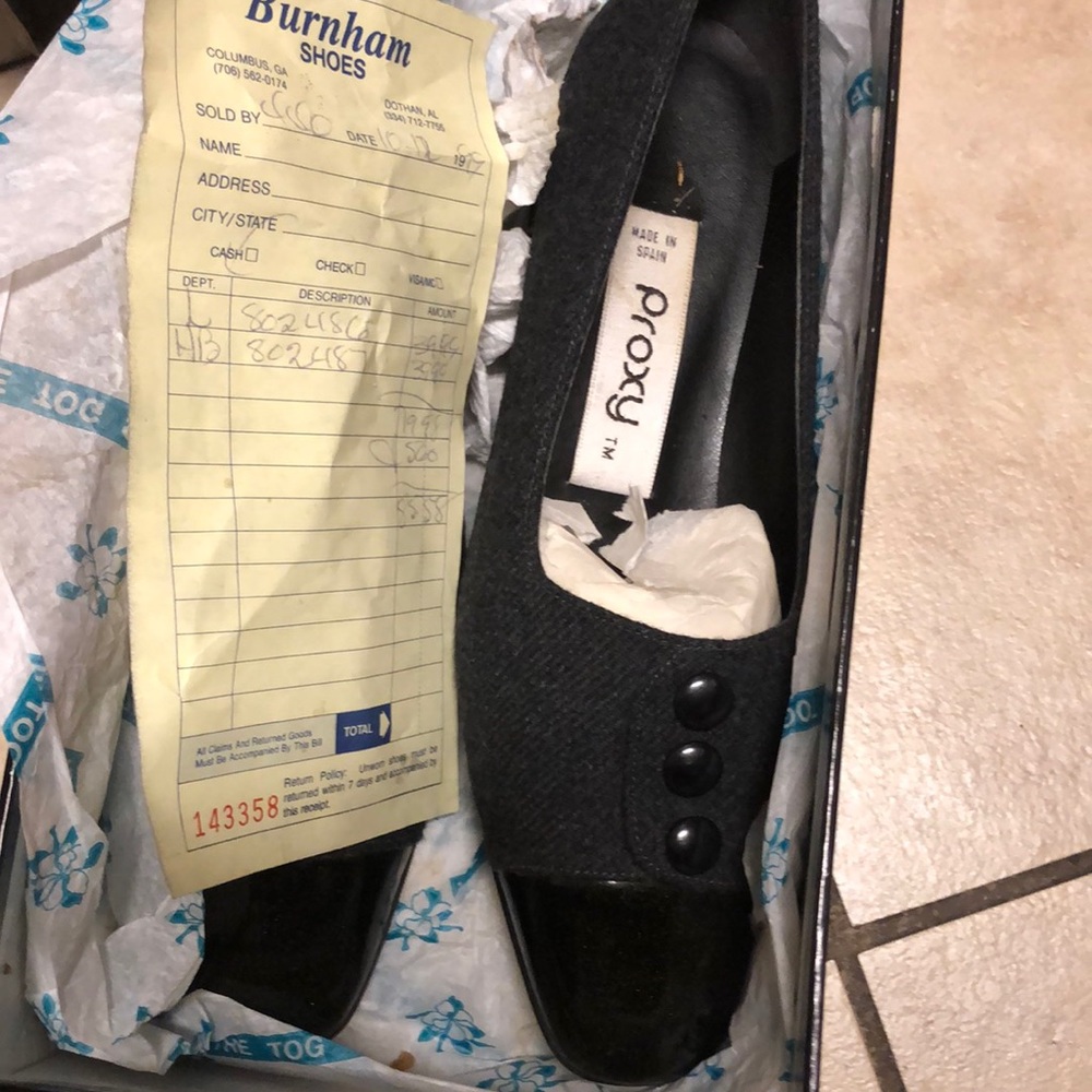 Lady’s Proxy 1.75” heel patent leather toed and fabric uppers.  Plastic buttons.